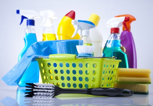 Professional office cleaning in a Highbury workspace with desks and reception area