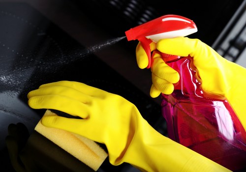 Local technician treating a stubborn sofa stain in Highbury