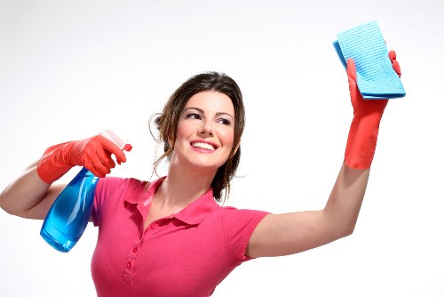 Local carpet cleaner working in a Highbury living room