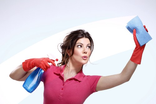 Domestic cleaner working in a Highbury flat with access-conscious planning